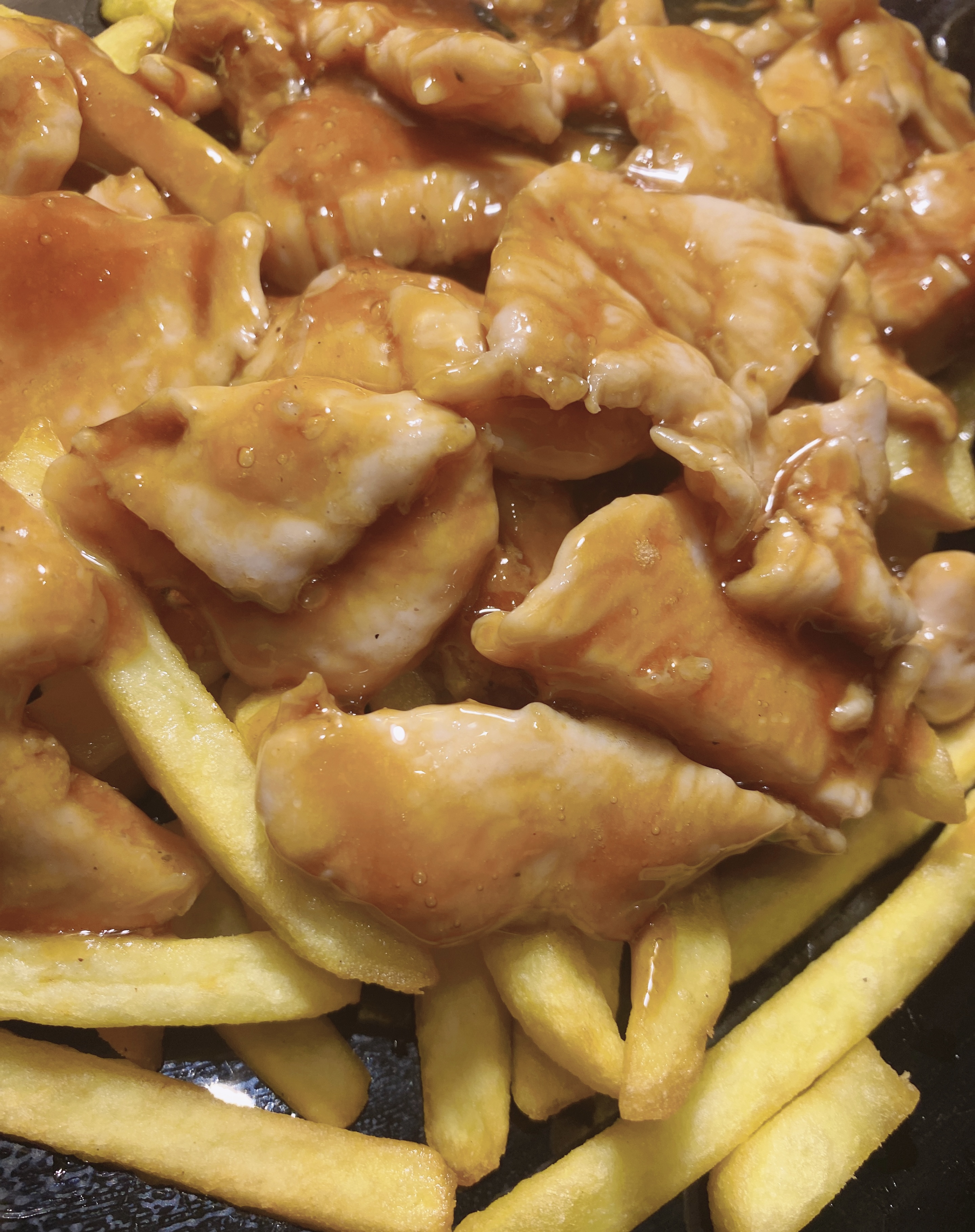 Pollo con patatas fritas